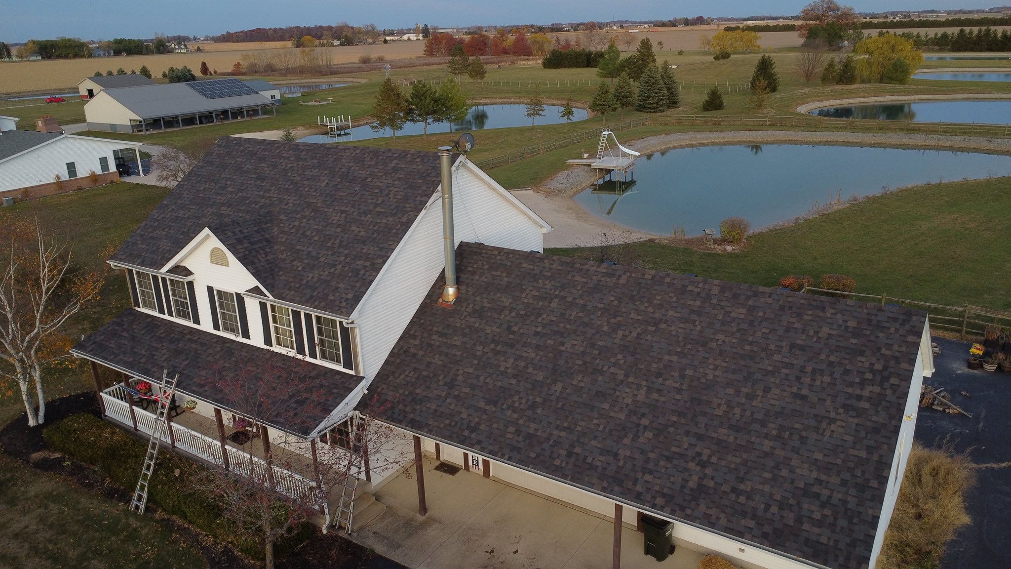 Country property with a new brown architectural roof